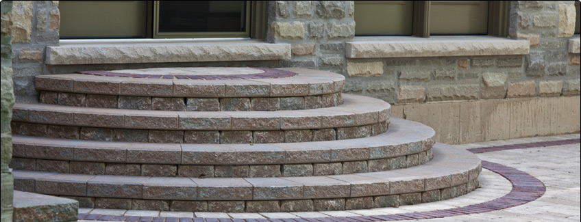 outdoor stone fireplace and interlocking patio